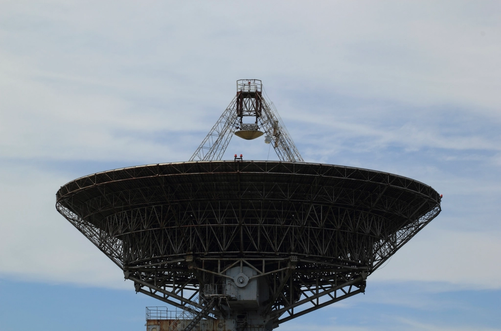 Large dish radio telescope against a pale sky